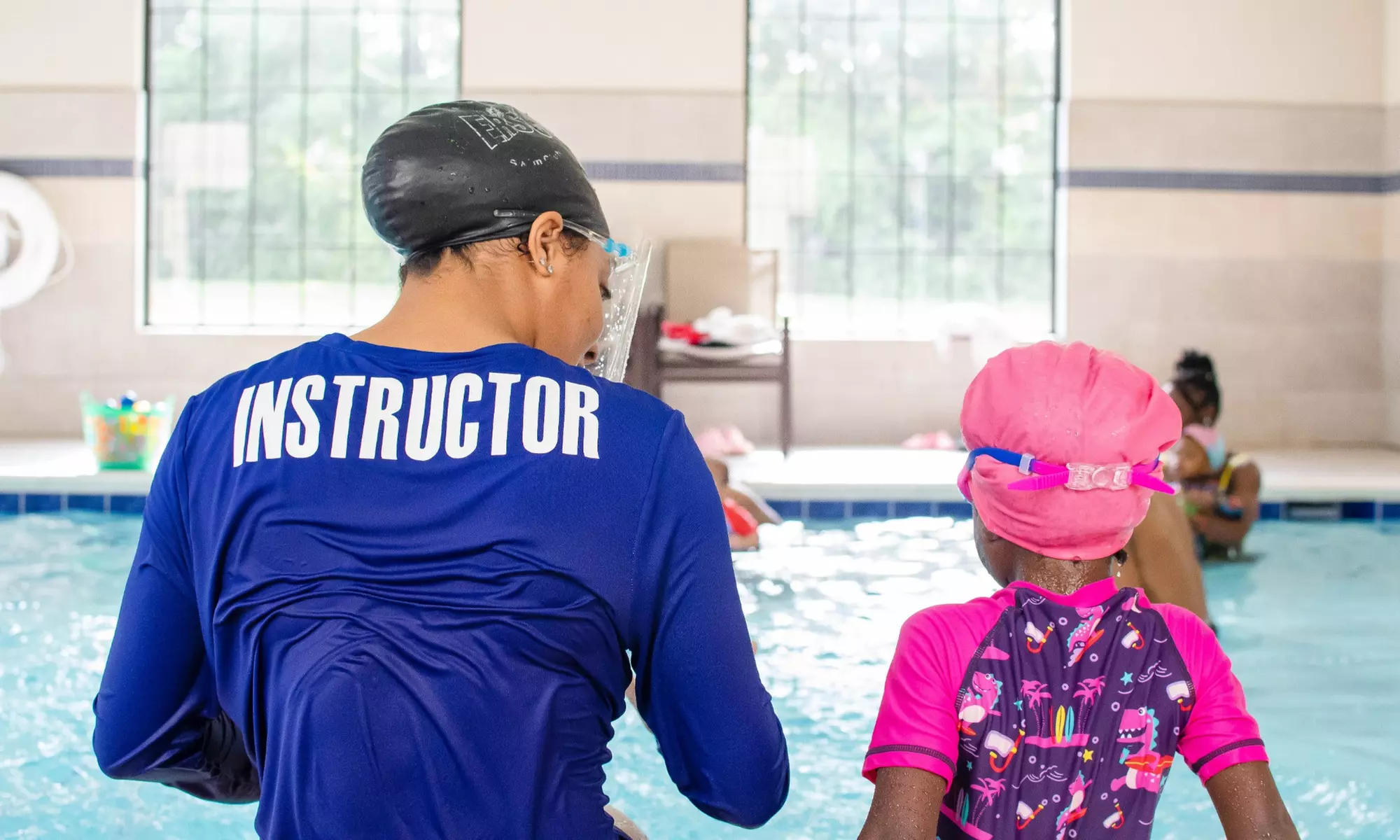 Four Group or Private Swimming Lessons for One Child at Dolphin University Swim School (Up to 45% - Primary Image