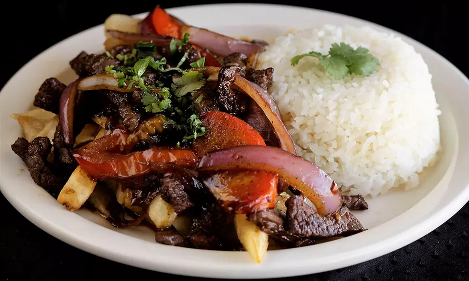 Peruvian Cuisine at Tineo Peruvian Cafe (Up to 28% Off). Two Options Available.  - Primary Image