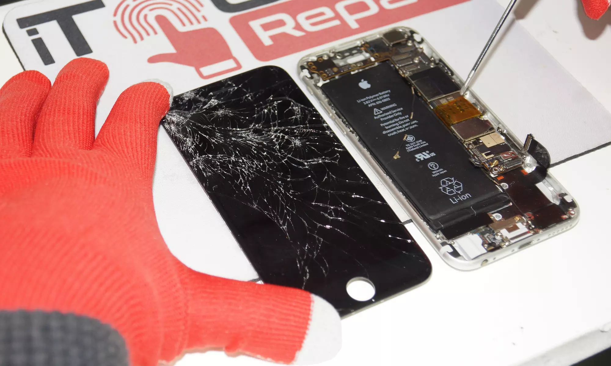 iPhone or iPad Screen or Touch IC Repair at iTouch Repair (Up to 67% Off). 14 Options Available. - Primary Image