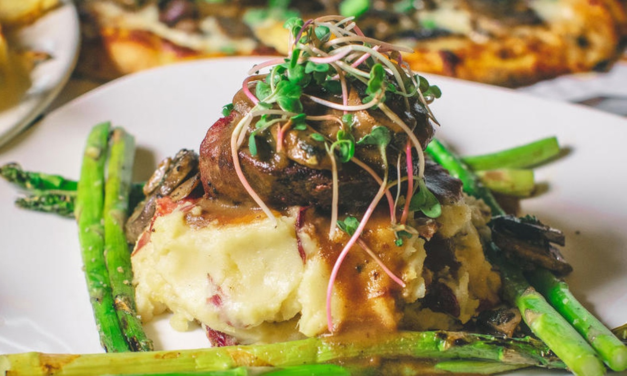 Enjoy $100 Towards Food & Drinks at Exchange, Dine-In or Takeout