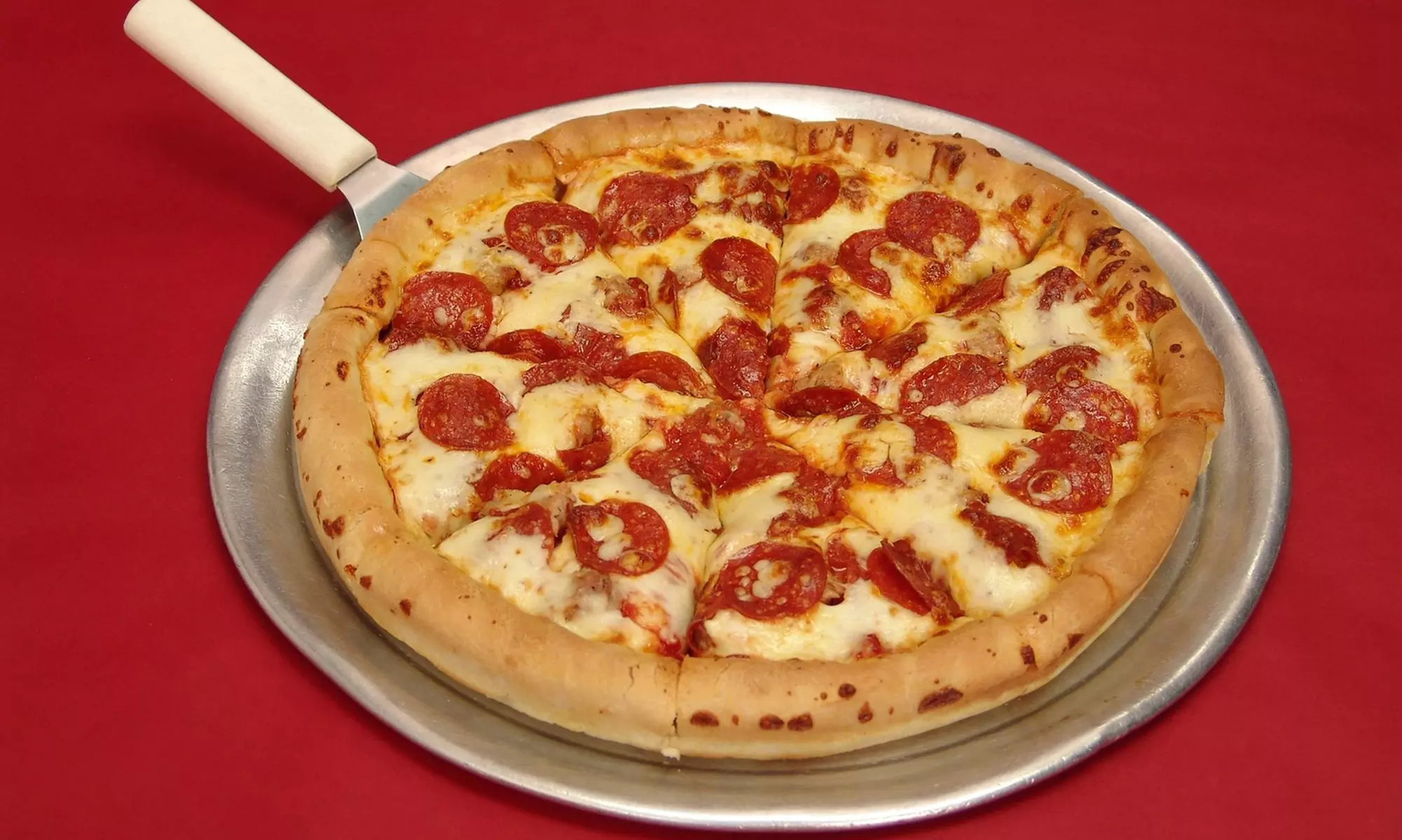 Chicago-Style Pizza, Appetizers, and Drinks at Frankie's Pizza (Up to 43% Off)   - Second Medium