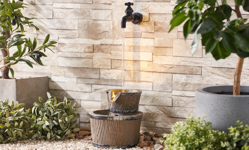 Image 1: Floating Tap Water Feature with Light