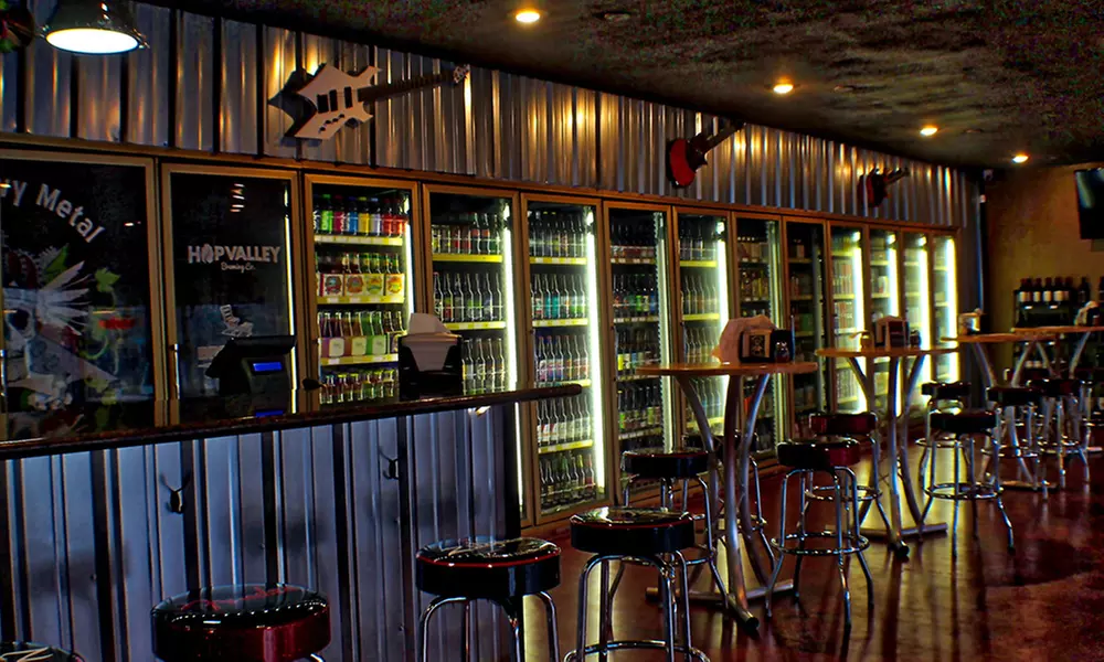 One or Two Beer Flights with 32oz Growlers & Fills at The Heavy Metal Brewing Co (Up to 48% Off). Four Options. - Primary Image