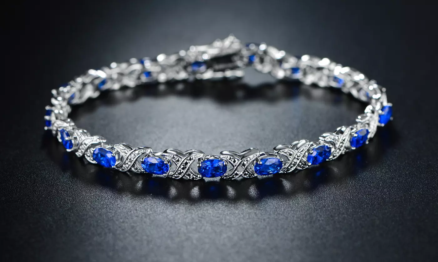 Lab-Created Blue Sapphire and Diamond Accent Tennis Bracelet by Peermont - Primary Image