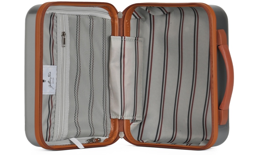 Image 15: Four Trolley Suitcases Set