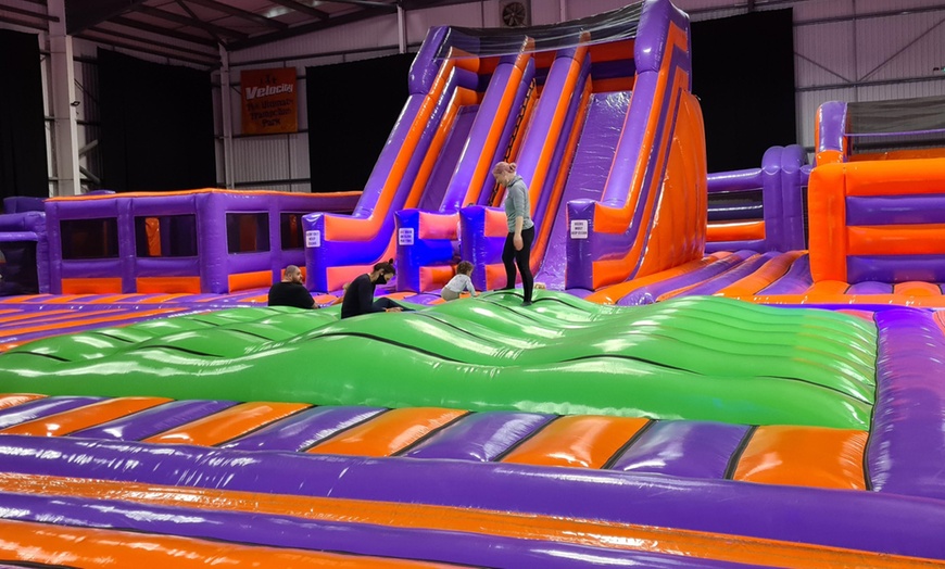 Image 5: Bounce into Fun: Inflatable Park Entry for Up to  Four People!