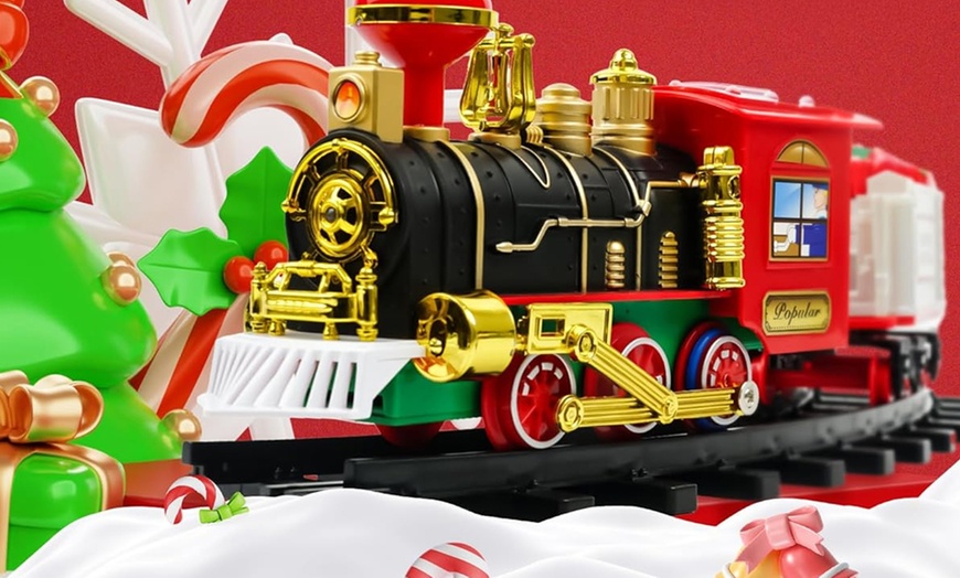 Image 4: Tren eléctrico decorativo para el árbol de Navidad con luces y sonidos