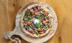 Vier de smaak van Italië met een heerlijke pizza à la carte en een dessert voor 1 tot 4 personen, nu met 36%