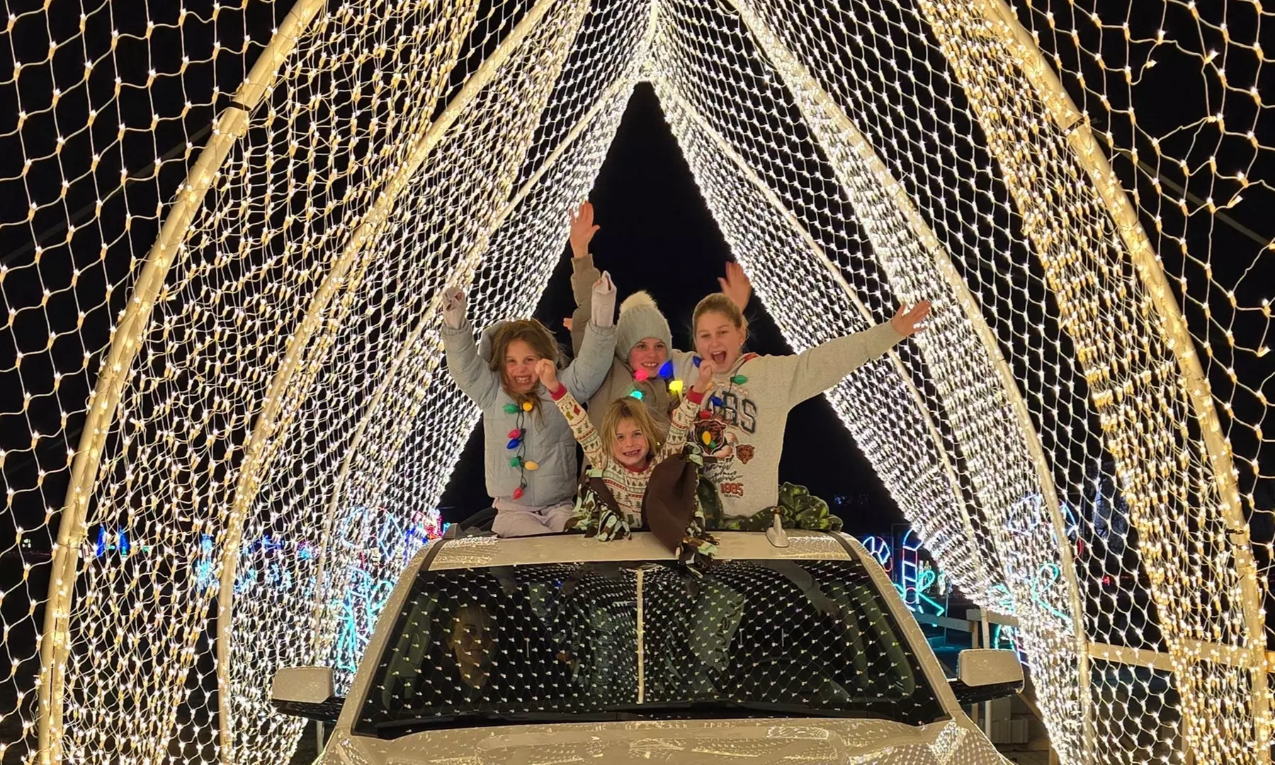 Experience Dazzling Holiday Magic: Drive-Thru Santa's Rock n' Lights in Chicago - Primary Image