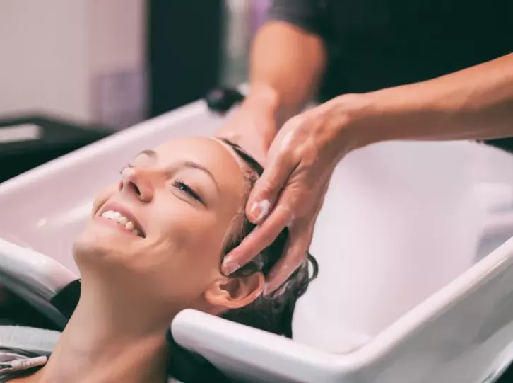Enjoy a Refreshing Haircut with Valet and Beverage