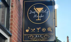 Oasis -Themed Fun: Interactive Darts & Pizza at Definitely Maybe Bar (Up To 55% Off)