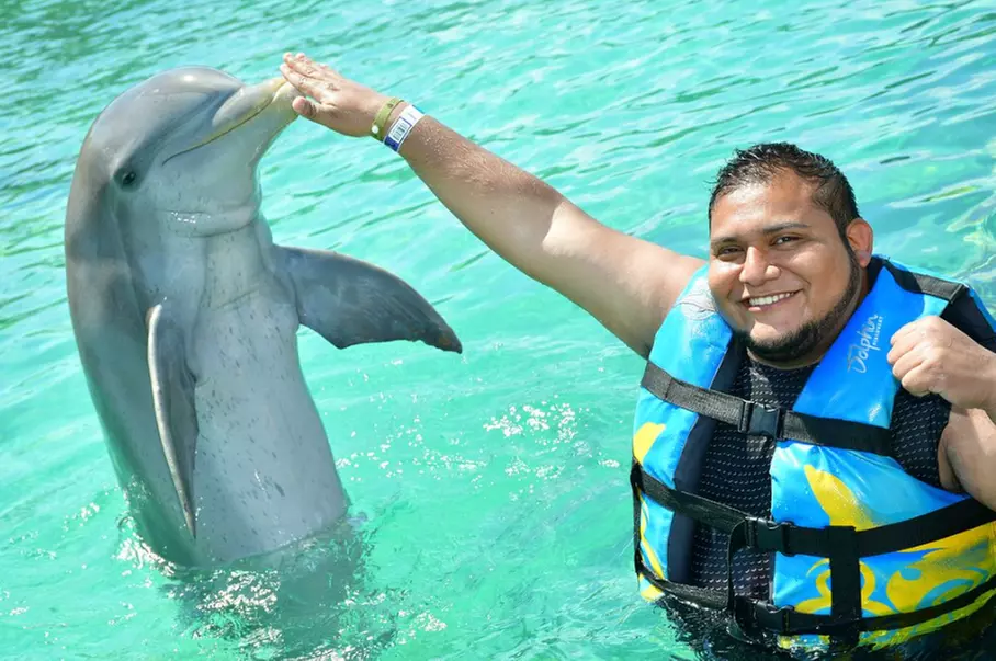 Discover Isla Muj: Royal Swim & Dolphin Encounter Await!