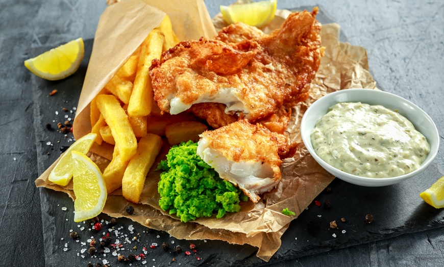 Image 1: Fish and Chips with Sparkling Wine at Cook's Bar & Kitchen