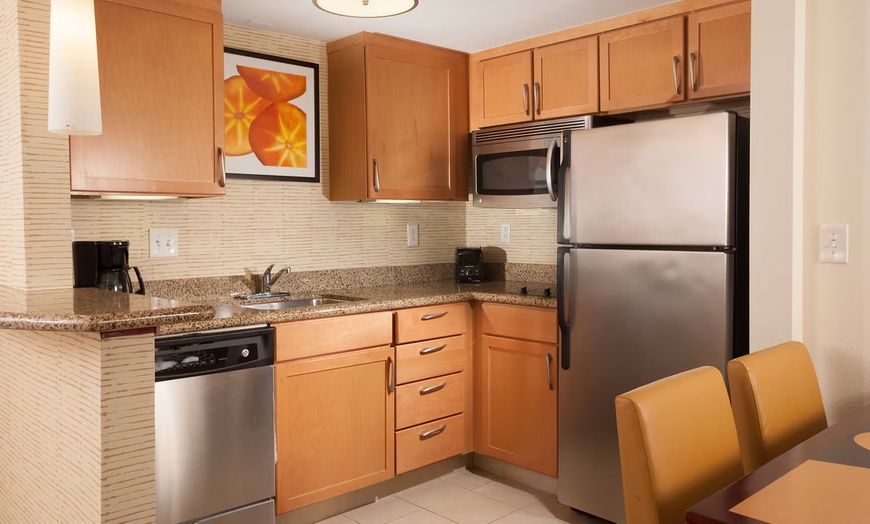 Image 7: Spacious suites, free breakfast, pool, and easy access to beaches