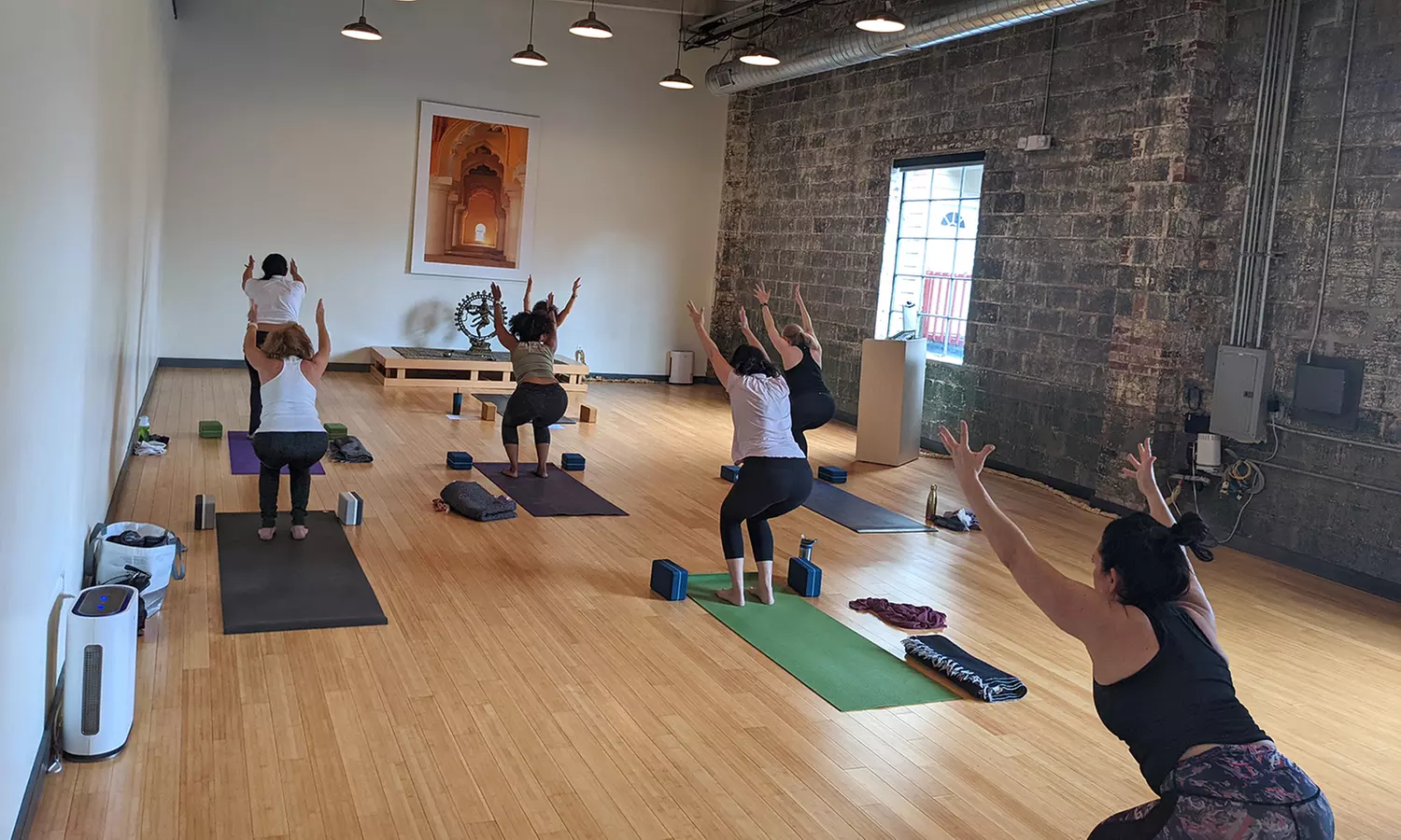 One, Three, or Five Yoga Class for All Levels - In-person or Online at Yoga Mechanics (Up to 52% Off) - Primary Image