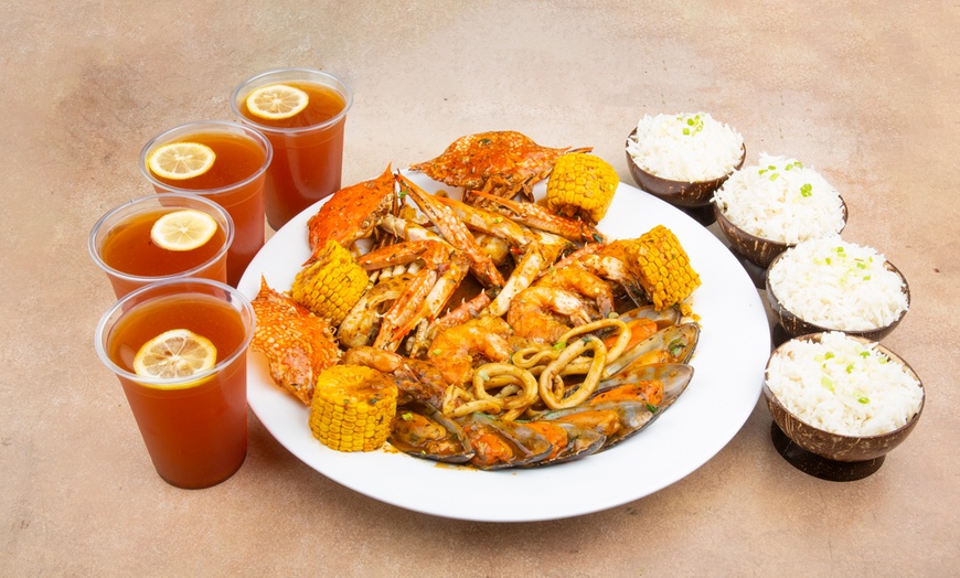 Image 5: Seafood with Rice, and Ice Tea