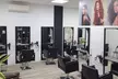Sesión de peluquería con corte y tratamiento capilar o tinte en opción en Centro de belleza Virginia Arias - Second Medium
