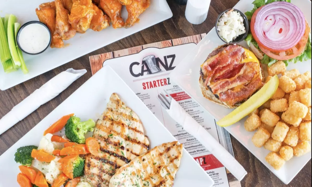 Food and Drink for Takoeut or Dine-In When Available at Canz Bar & Grill (Up to 30% Off). Two Options Available. - Primary Image