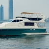 Image 6: 1.5 Hours Shared Marina Canal Yacht Tour for One Child or Adult