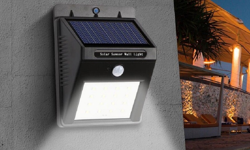 Image 1: Up to Four LED Wall Lights with Solar Panel and 120° Motion Sensor