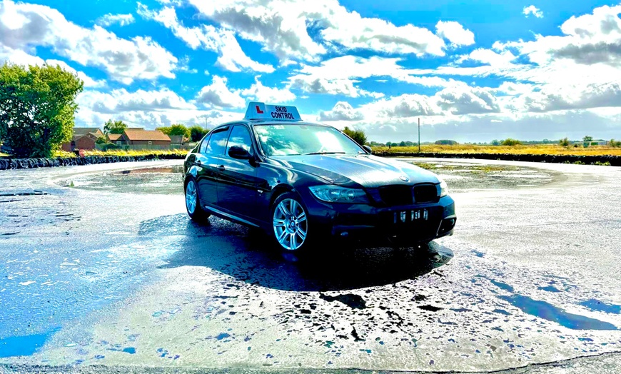 Image 1: 1, 2-Hour, or Half-Day Skid Pan Driving Experience for 1, 2, or 3