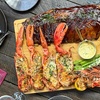 Image 2: Surf & Turf: Whole Lobster, Ribs & Seafood Platter with Bottle of Wine