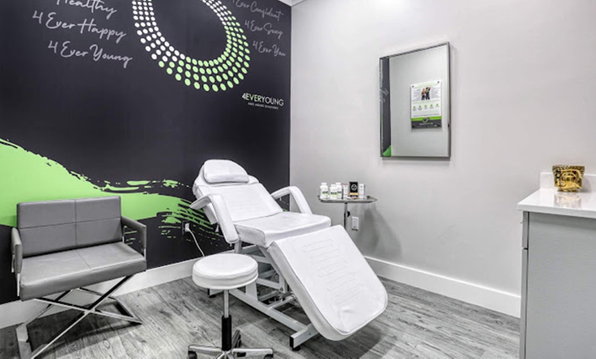 Image 2: Clear skin, your way—try Acne and Customized Facials at 4Ever Young