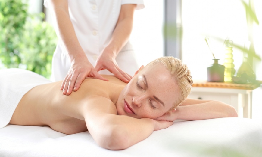 Image 2: Ultimate Relaxation & Deluxe Massages with Hot Stones & Essential Oils