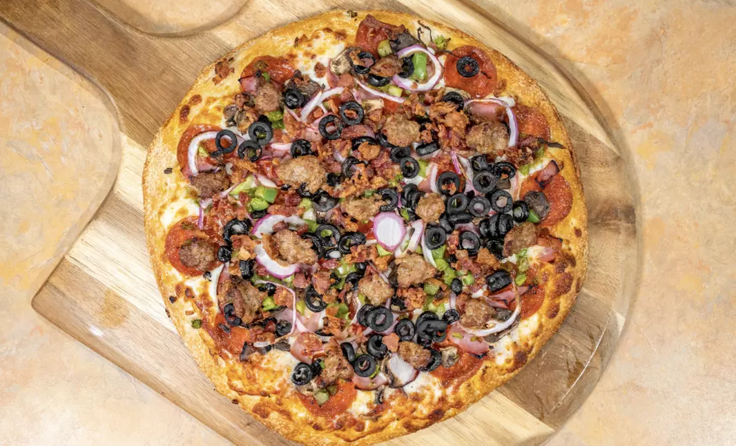 Up to $100 Towards Food and Drinks at Memelli Sports Bar (Up to 41% Off) - Primary Image