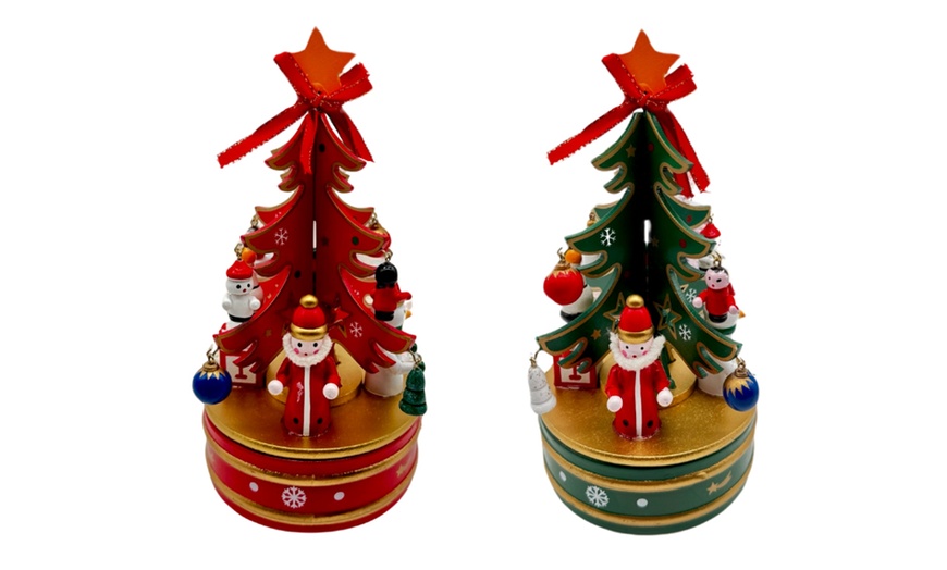 Image 7: Houten carrouselletje met kerstthema