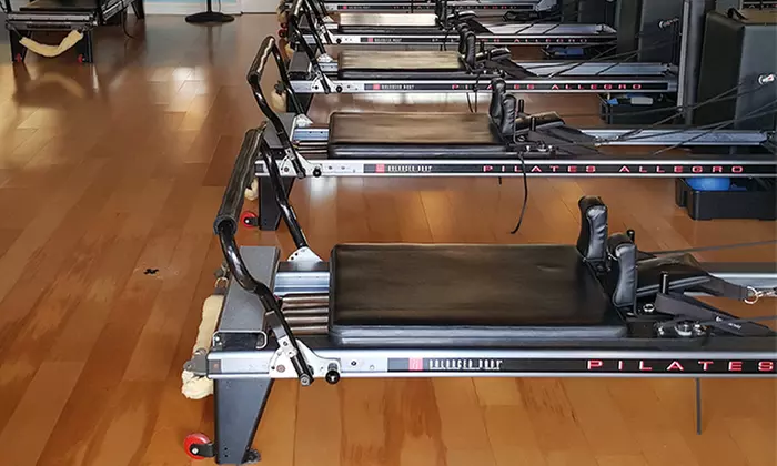 5 or 10 Pilates Reformer Classes with Two Jump-Board Classes at Pilates South Bay (Up to 78% Off) - Primary Image