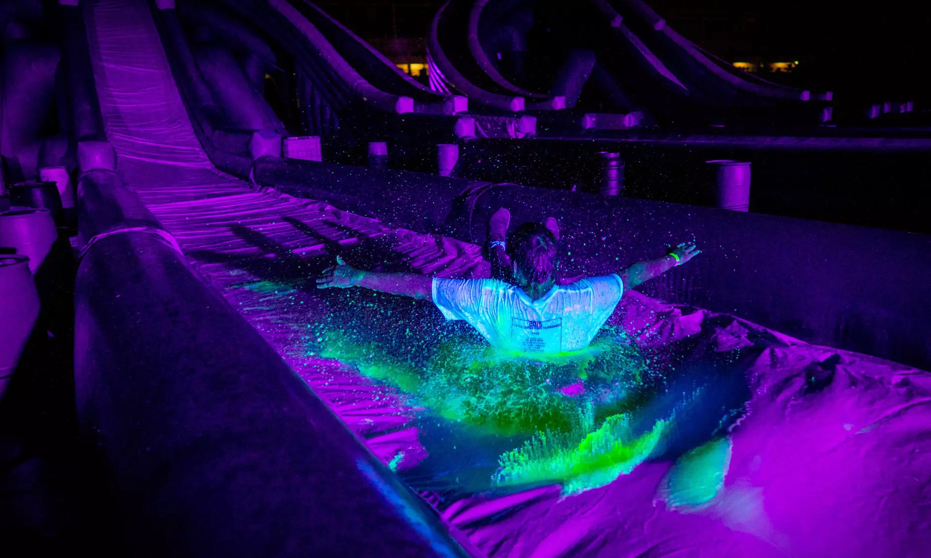 Blacklight Slide Glow-in-the-Dark Party on Saturday, April 22, at 6 p.m. - Primary Image