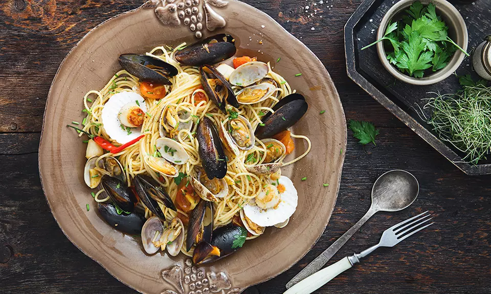Four-Course Weekday or Weekend Dinner for Two or Four at Tigo Trattoria Valid for Dine-In or Takeout(Up to 41%) - Primary Image
