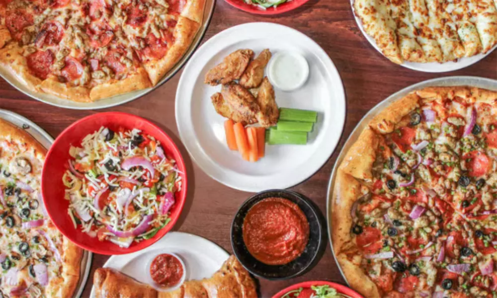 $25,$50, or $100 Spend on Food & Drinks or Choice of Pizza + Toppings