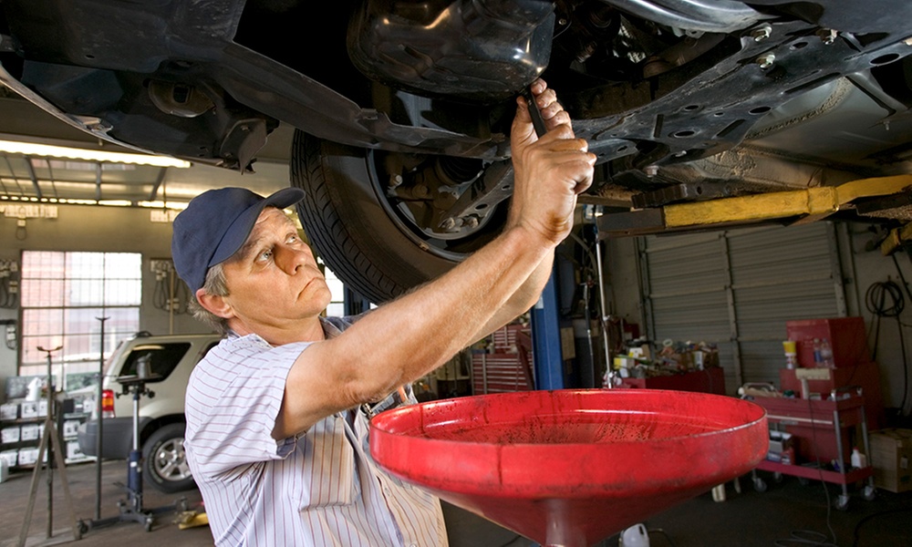 One Conventional or Synthetic Oil Change with Free Computer Scan