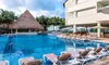 ✈ 4-Night All-Inclusive Isla Mujeres Palace Stay with Airfare. Price per Person Based on Double Occupancy.