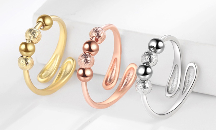 Image 1: 2x Elegante Spinner-Ringe mit drehbaren Perlen zur Entspannung