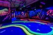 Family Fun Awaits with 12 Holes of Glow in the Dark Mini Golf with 3D Artwork! - Second Medium