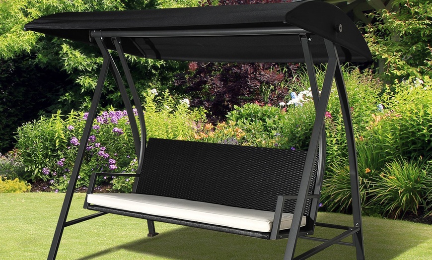 Image 7: Outsunny Rattan-Effect Three-Seater Swing Chair