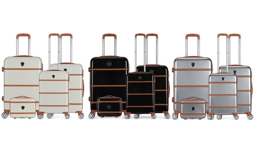 Image 1: Four Trolley Suitcases Set