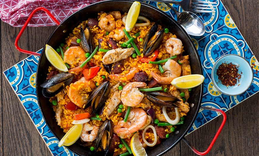 Image 1: Paella and Wine for Two
