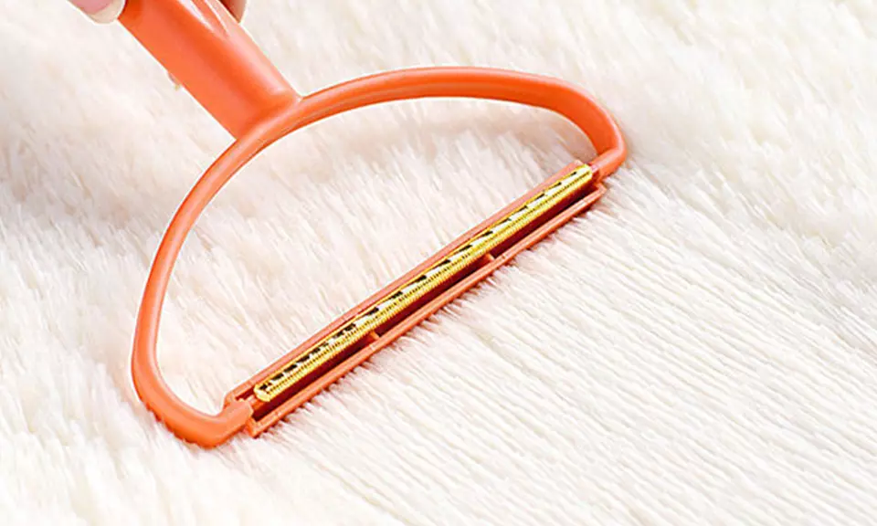 Tragbarer Fusselentferner