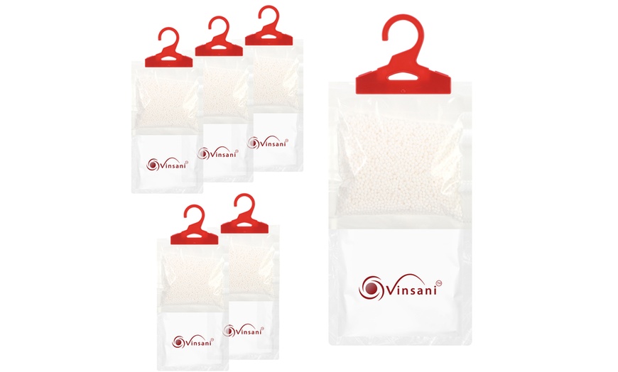 Image 1: Six Hanging Wardrobe Dehumidifier Bags