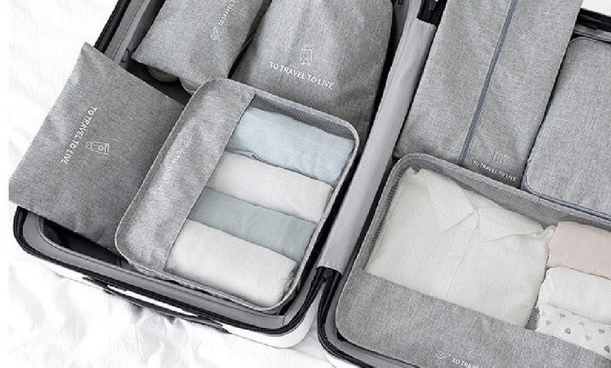 Image 2: Seven Packing Cubes for Suitcases