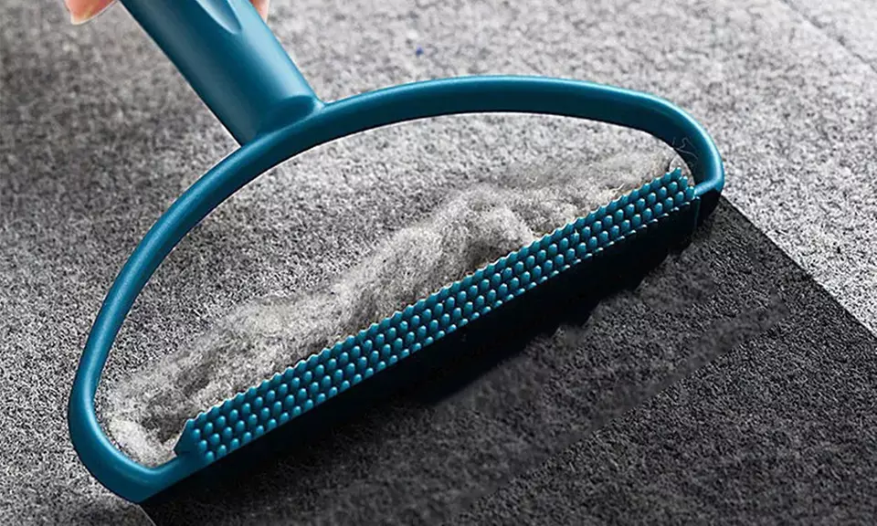 Tragbarer Fusselentferner