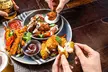 Sizzling Pub & Grill: Tuck In & Turn Up the Heat with delicious Starters & Skillets (Up to 35% Off) - Second Medium
