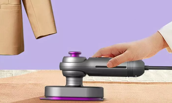 Plancha portátil de vapor y en seco con mango giratorio y depósito - Primary Image