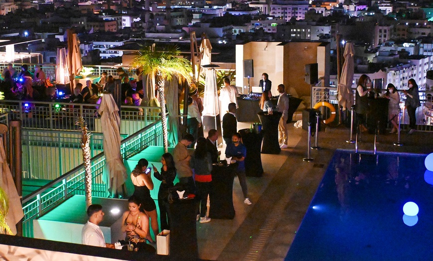 Image 3: New Year Eve Rooftop Party Entry, Three Course Menu, and Beverages