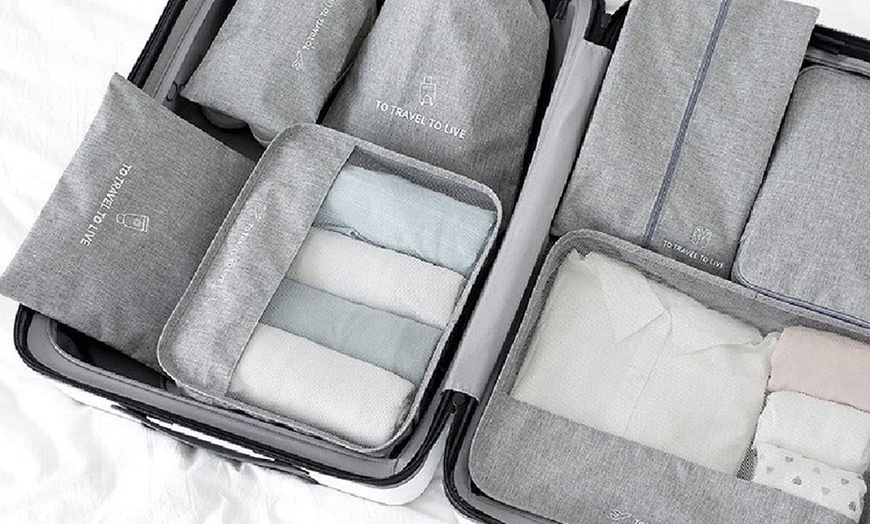 Image 7: Seven Packing Cubes for Suitcases