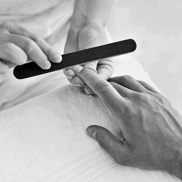 At Men's Spa, enjoy a manicure and spa pedicure experience for returning clients and newcomers with up to 19% off - Primary Image